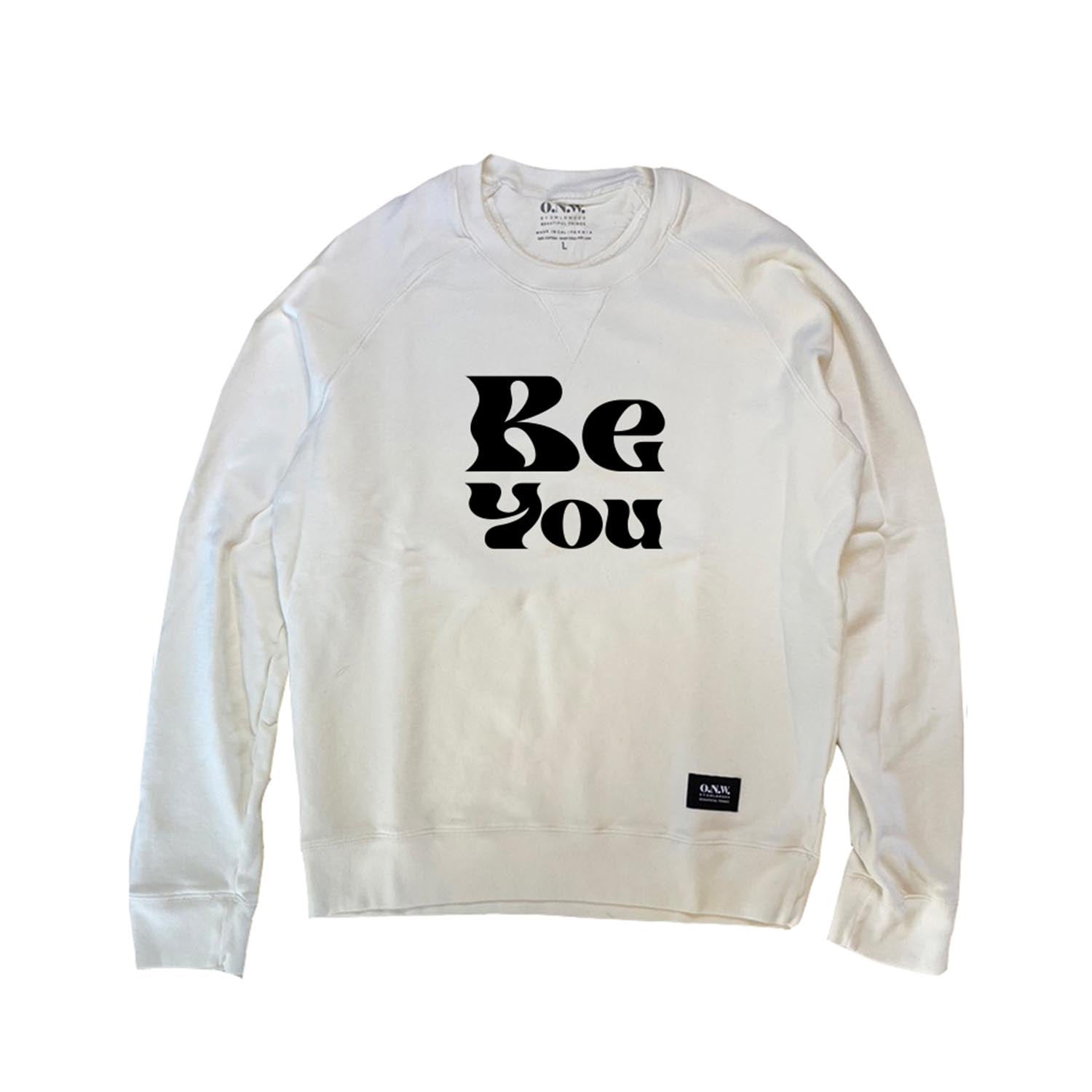 Unisex crew neck sweatshirt in off white with "Be You" graphic from Owl N Wood